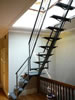 Interior Brownstone access stairs to hatch onto roof deck