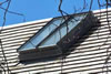 Lead coat copper operable skylight on cedar shingle roof